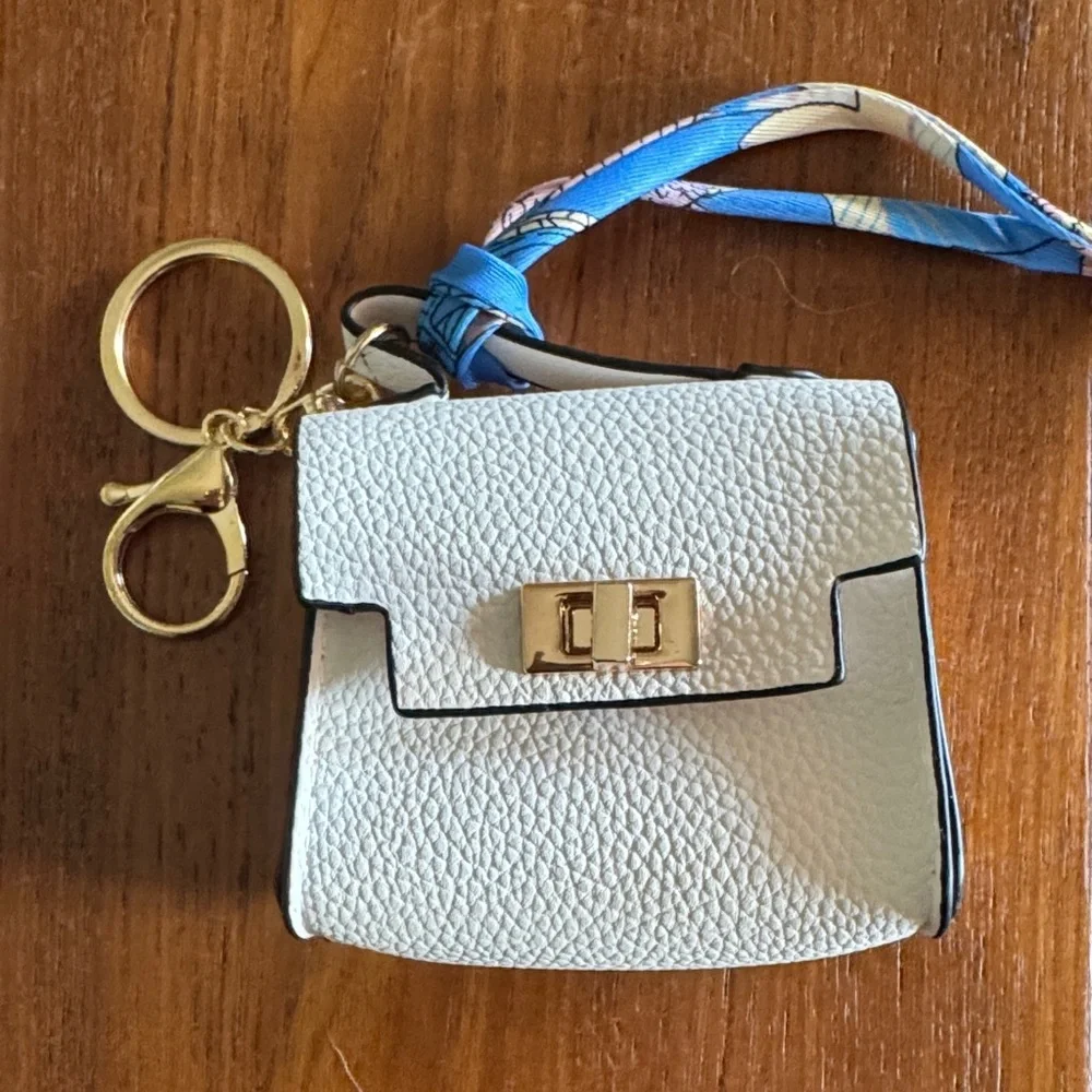 Key chain White Pebbled Bag with Gold Details